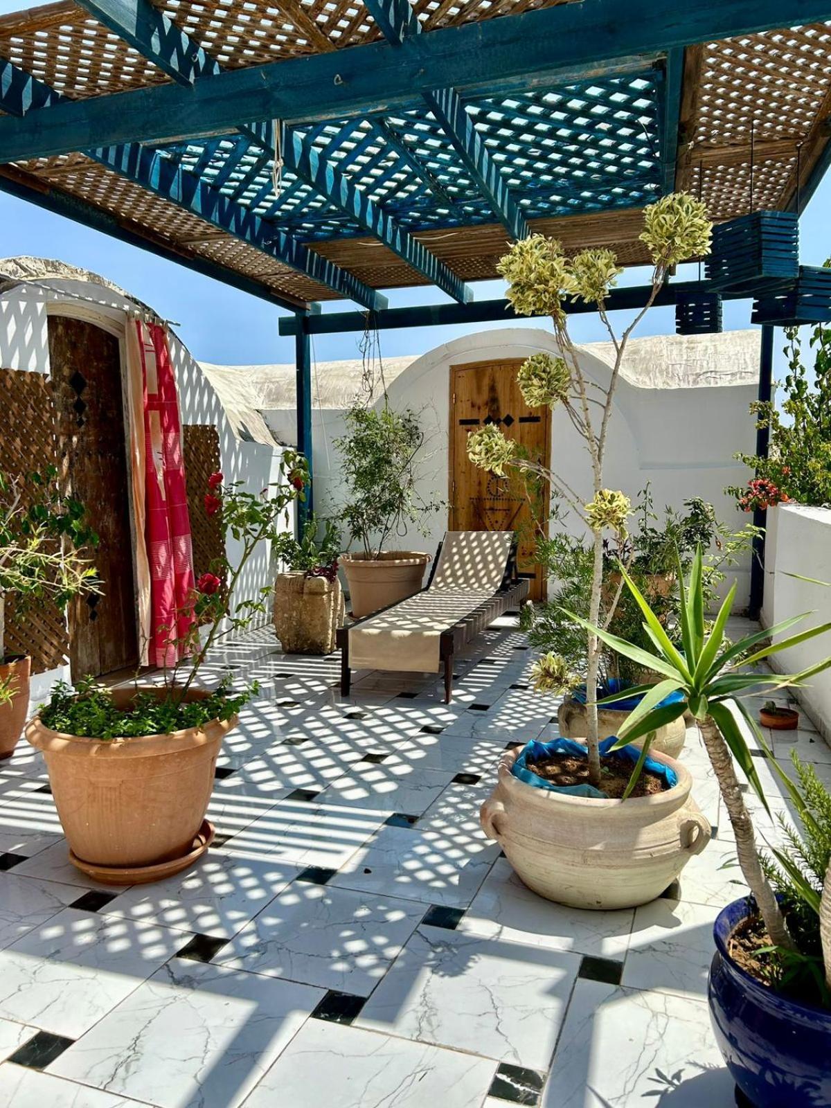 L'Artisan Hotel Harqalah Exterior photo