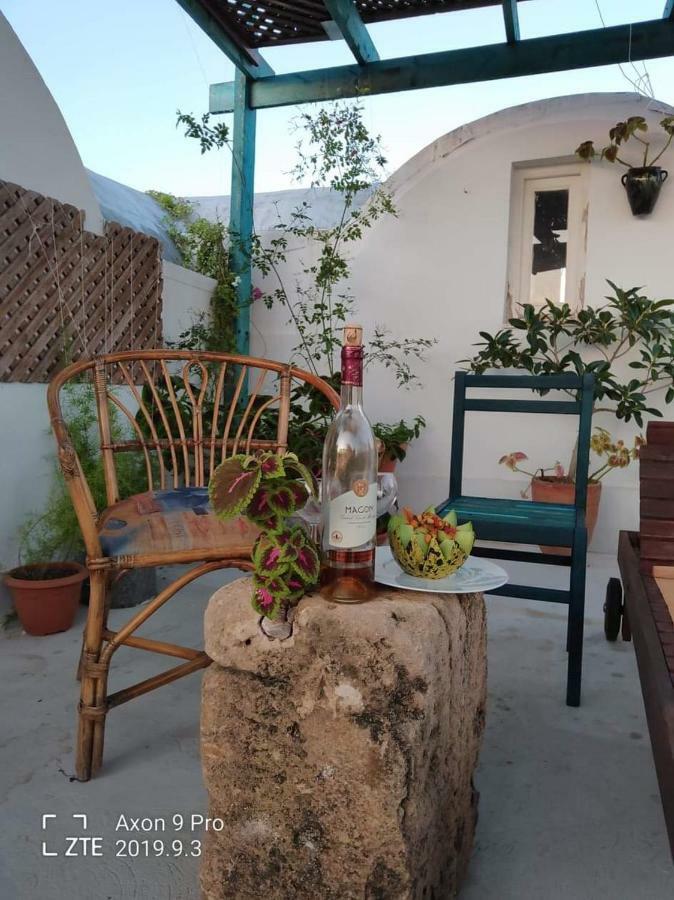 L'Artisan Hotel Harqalah Exterior photo